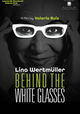 Behind the White Glasses
