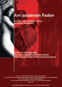 Am seidenen Faden